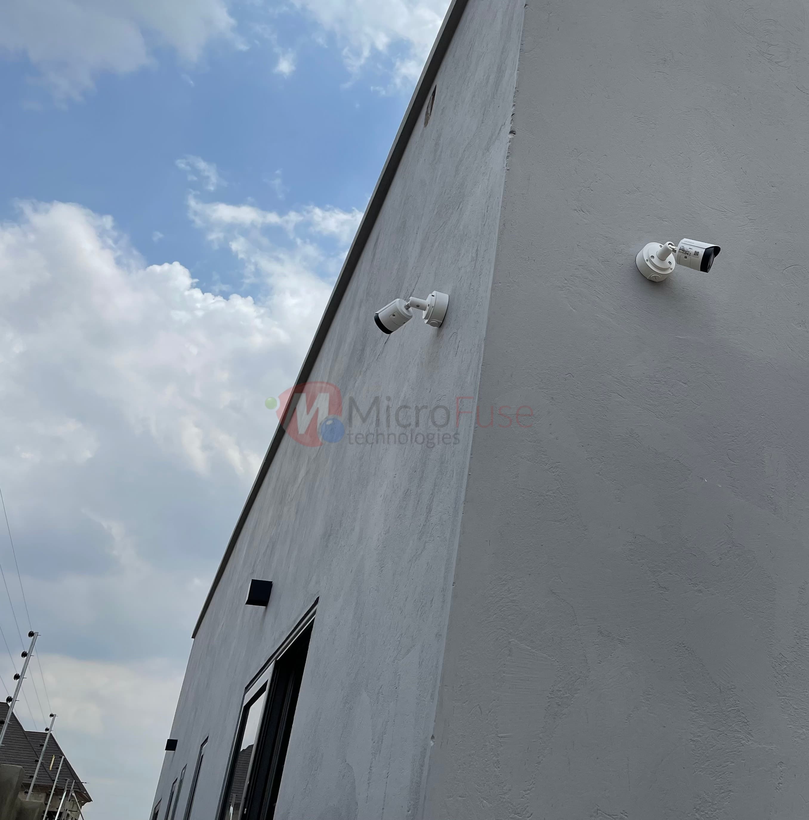 Dome and eave cameras covering perimeter