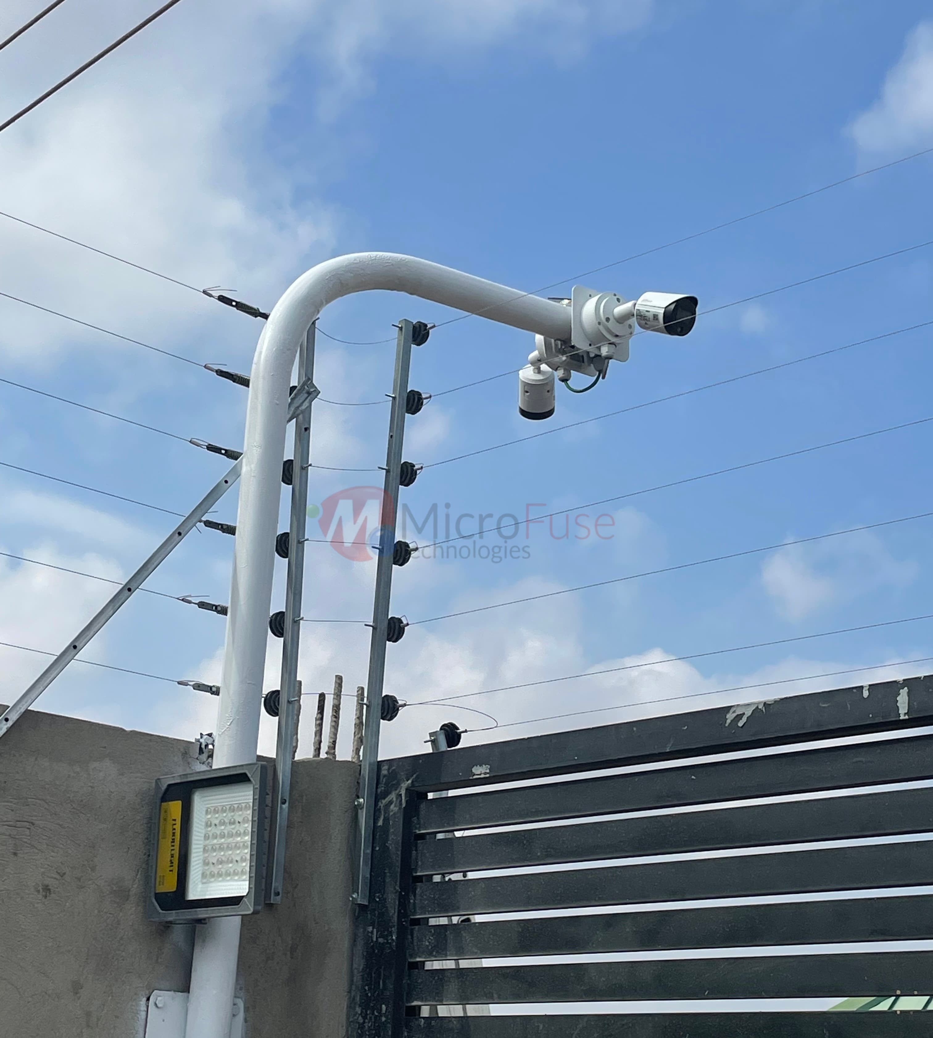 CCTV camera pole installation with mounting bracket