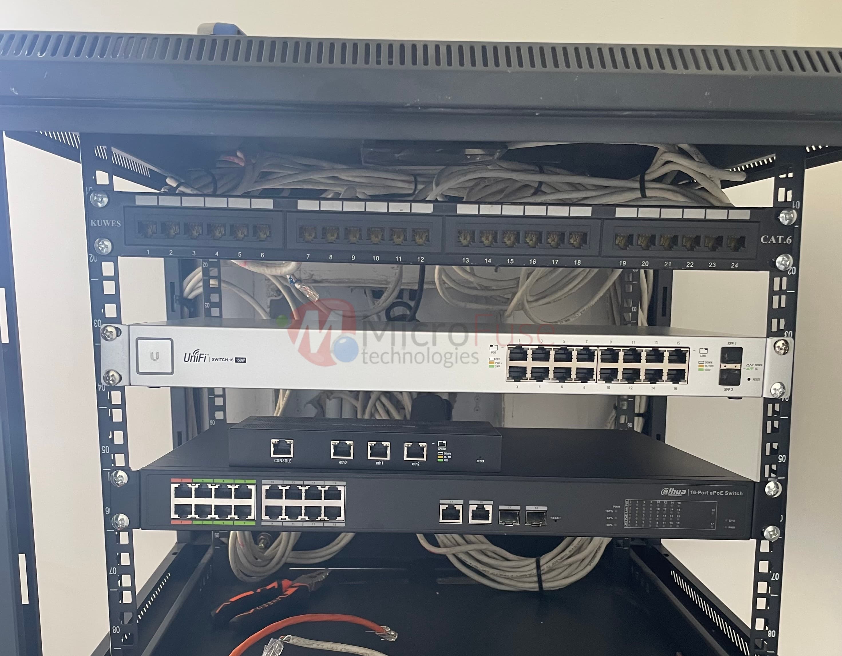 Network rack with UniFi and ePoE switches